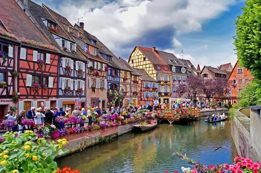 Half-timbered houses and a canal in Colmar, France.